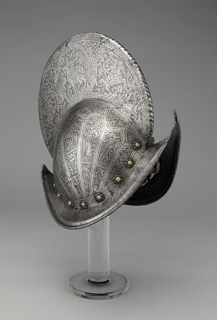 Шлем типа "морион", 1570 г. Коллекция Джорджа Ф. Хардинга. Высота 34,3 см. Высота гребня 12,1 см. Вес. 1,92 кг.