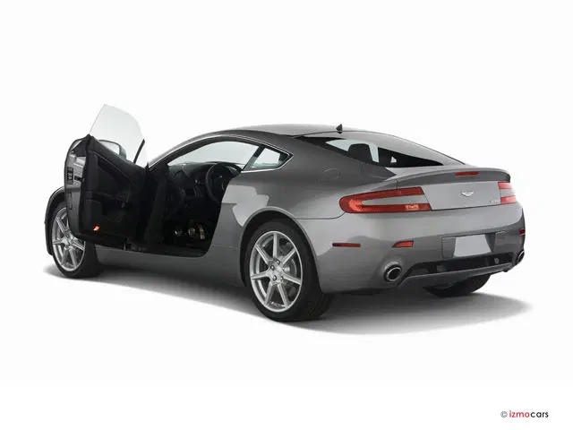 Aston Martin Vantage (2009) Фото с сайта: https://cars.usnews.com/static/images/Auto/izmo/308941/2009_aston_martin_vantage_doors.jpg