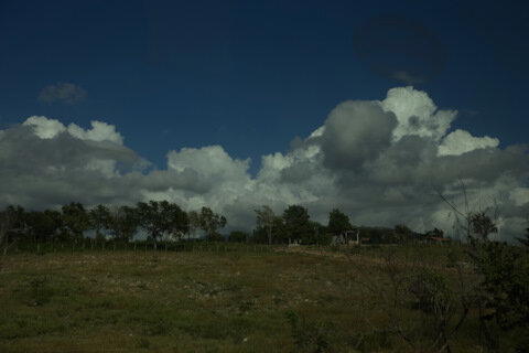 Облака прям как дома. Да и холмы схожи.